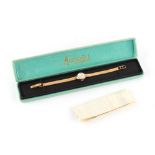 Property of a deceased estate - a lady's Accurist 9ct gold cased wristwatch with 21 jewels, on 9ct