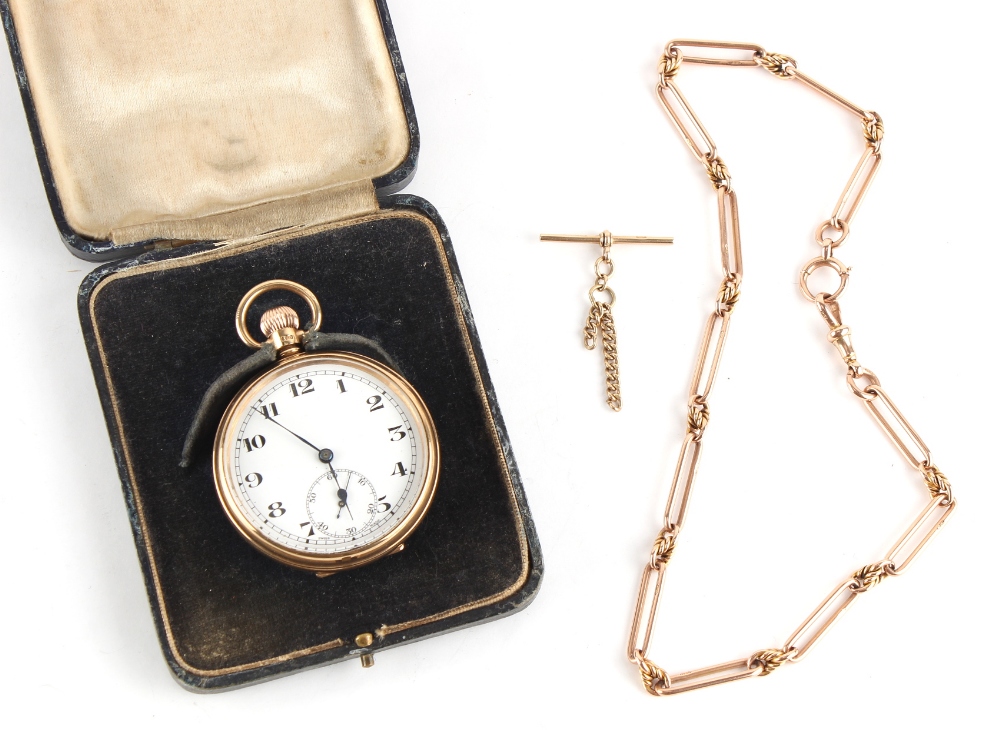 Property of a lady - a 9ct gold cased open faced keyless wind pocket watch, the dust cover also