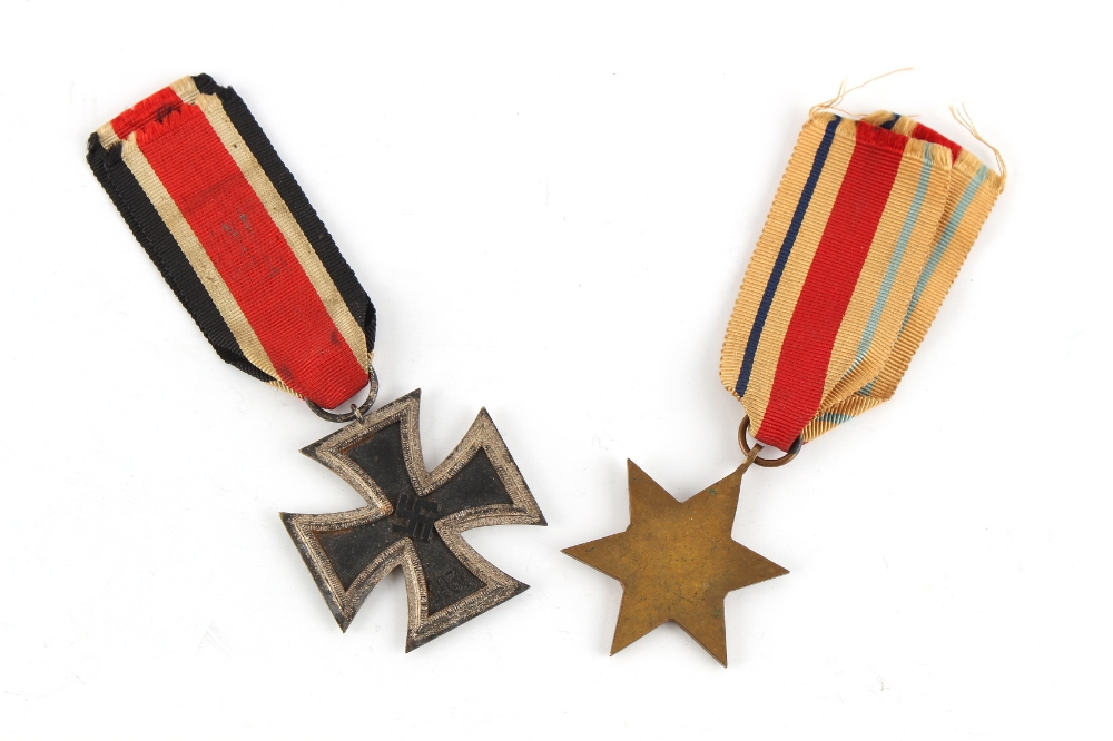 Property of a deceased estate - military medals - a Second World War 1939 Third Reich Iron Cross, - Image 2 of 2