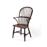 Property of a gentleman - a George III elm seated ash stick-back Windsor elbow chair, circa 1800,
