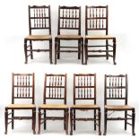 Property of a lady - a matched set of seven late 18th / early 19th century fruitwood & rush seated