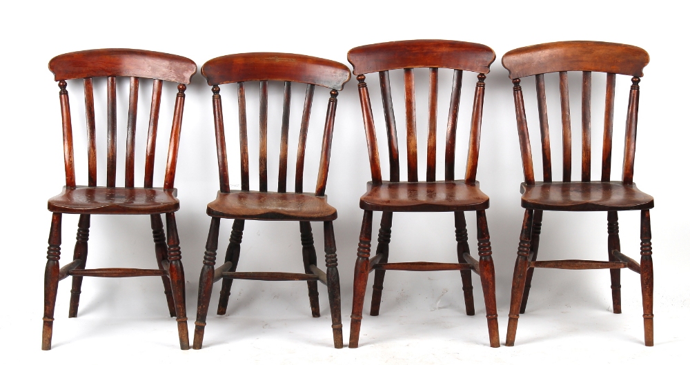 Property of a gentleman - a set of four Victorian elm seated lath-back kitchen chairs, with turned