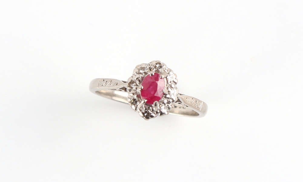 An 18ct white gold ruby & diamond oval cluster ring, size L. - Image 2 of 2