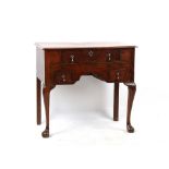 Property of a lady - an elm lowboy, elements 18th century, 32.25ins. (82cms.) wide (overall).