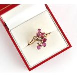 Property of a lady - a yellow gold ruby & diamond ring, set with six marquise cut Thai rubies &