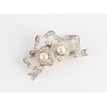 A Victorian diamond & pearl twin heart ribbon brooch, the estimated total diamond weight 2.0 carats,