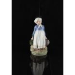 Property of a deceased estate - a Royal Copenhagen porcelain figure of a Country Girl, model