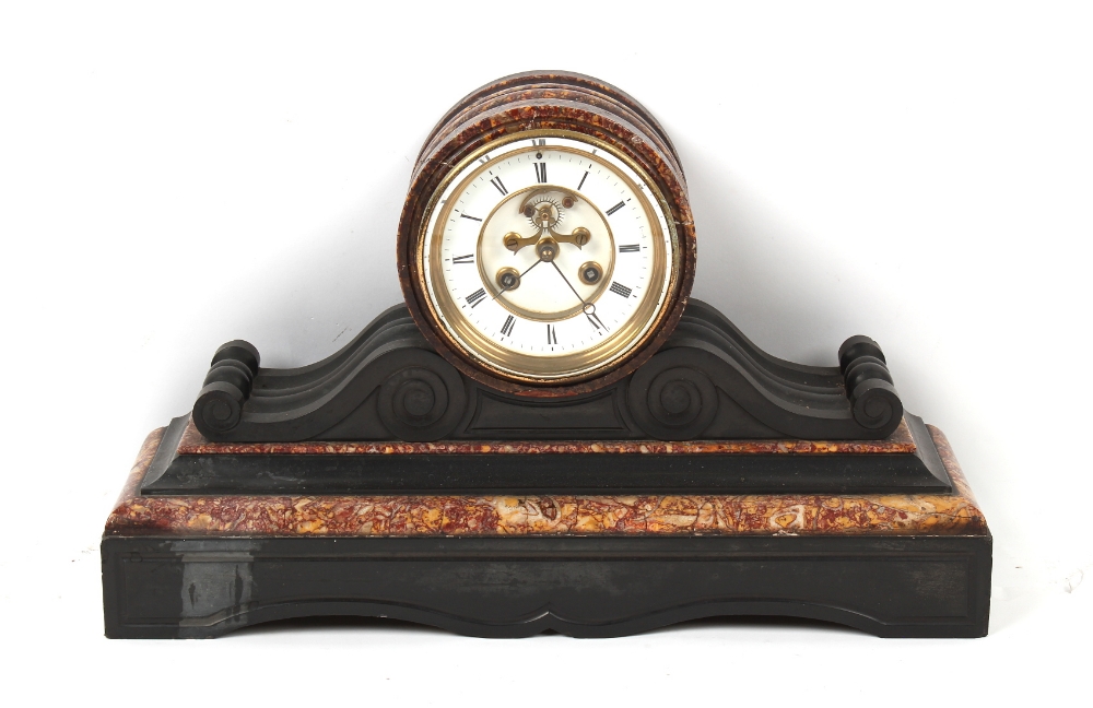 Property of a deceased estate - a 19th century rouge & black marble cased mantel clock, the French