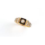 A Victorian 18ct yellow gold black enamel & seed pearl mourning ring, engraved to the inside of