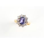 An 18ct yellow gold tanzanite & diamond ring, the octagonal cut tanzanite weighing approximately 1.