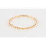 Property of a lady - an unmarked 22ct gold (tested) bangle, probably Indian, approximately 8.6