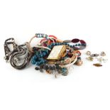 Property of a deceased estate - a bag containing assorted costume jewellery including a 9ct gold