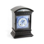 Property of a gentleman - an Aesthetic Movement ebonised & enamel cased mantel clock, with enamel