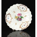 Property of a gentleman - a Meissen moulded dish painted with flowers, blue crossed swords mark,