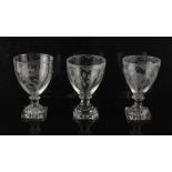 A private collection of English glass rummers - three George III engraved rummers, with square '