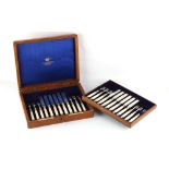 Property of a deceased estate - a set of twelve each silver dessert knives & forks with mother-of-