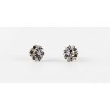 A pair of 9ct gold sapphire & diamond cluster stud earrings, each approximately 11mm diameter,