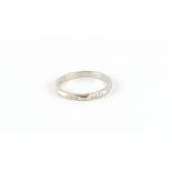 Property of a deceased estate - a platinum wedding band, approximately 3.4 grams, size L/M.