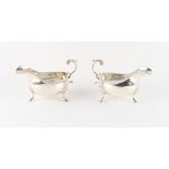 Property of a deceased estate - a pair of George II style silver sauceboats, Roberts & Belk,