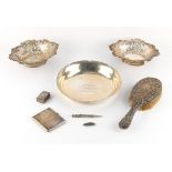 Property of a gentleman - a silver shallow dish, with petal rim & engraved presentation