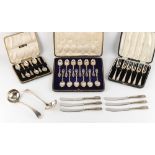 Property of a lady - a cased set of twelve silver teaspoons, with entwined twig handles; together
