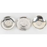 Property of a lady - three assorted silver coin dishes, two unmarked, each approximately 4.15ins. (