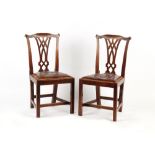 Property of a gentleman - a pair of George III fruitwood side chairs with leather covered drop-in