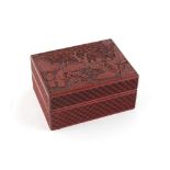 A Chinese carved cinnabar lacquer rectangular box, 18th / 19th century, the cover depicting scholars