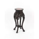 Property of a gentleman - a late 19th / early 20th century Chinese carved hardwood stand with