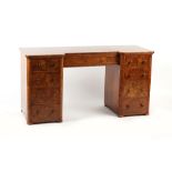 Property of a lady - a burr & figured walnut kneehole dressing table, elements Victorian, 58.