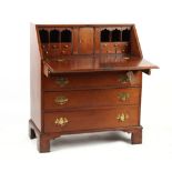 Property of a gentleman - a George III mahogany fall-front bureau, with four long graduated drawers,