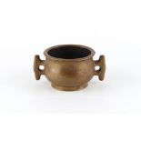 Property of a deceased estate - a small Chinese bronze two handled bombe censer, 2-character mark to
