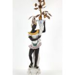 Property of a lady - a large modern Continental faience Blackamoor table lamp, with shade, 43.