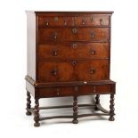 Property of a gentleman - a late 17th / early 18th century walnut chest on later stand, 39.75ins. (