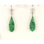 A pair of unmarked 18ct white gold jadeite & diamond pendant earrings, the jadeite drop shaped