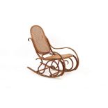 Property of a deceased estate - a Victorian bentwood rocking chair with cane panelled seat & back.