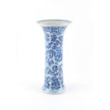 Property of a lady - a Chinese blue & white moulded & waisted vase, Kangxi period (1662-1722),