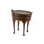 Property of a deceased estate - a coopered mahogany oval planter, with zinc liner, on later cabriole