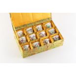 Property of a lady - a boxed set of twelve Chinese famille rose porcelain tea bowls, variously