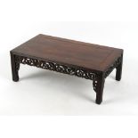 Property of a lady - a 19th century Chinese carved hongmu kang table, one small section of a