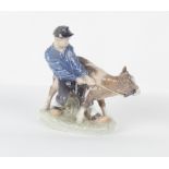 Property of a deceased estate - a Royal Copenhagen model 772 figure of a boy & calf, 6.7ins. (