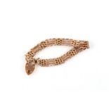 Property of a deceased estate - a 9ct gold gate link bracelet with heart shaped clasp, approximately