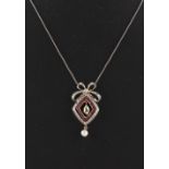 An early 20th century Belle Epoque ruby diamond & pearl pendant on later chain necklace, with
