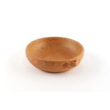 Property of a deceased estate - Robert 'Mouseman' Thompson of Kilburn - an English oak nut dish,