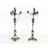 Property of a lady - a pair of late 19th century French silvered metal & gilt brass three light