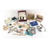 Property of a deceased estate - a bag containing assorted watches, costume jewellery, military