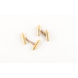 Property of a gentleman - two similar gold cufflinks, one marked 18ct, the other 9ct,