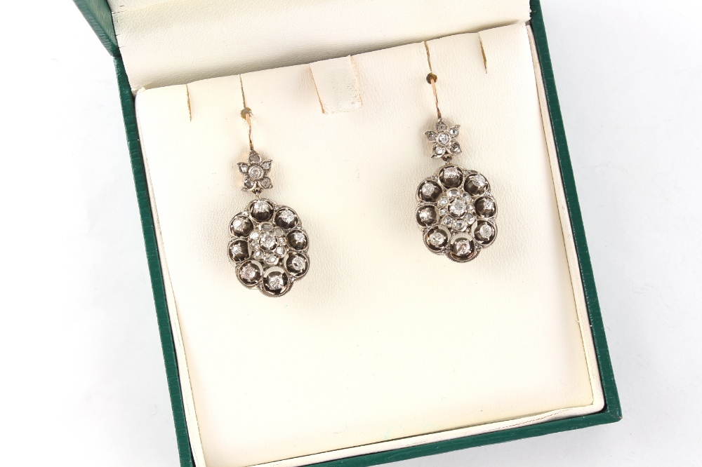 A pair of diamond cluster pendant earrings, set with old cut & rose cut diamonds, each approximately