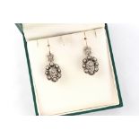 A pair of diamond cluster pendant earrings, set with old cut & rose cut diamonds, each approximately