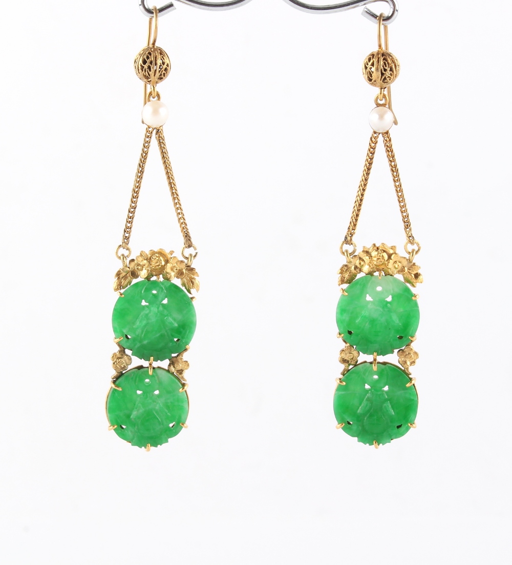 A pair of Chinese high carat yellow gold carved apple green jadeite & pearl pendant earrings, each